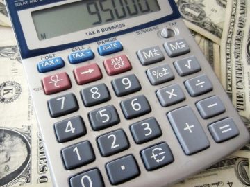 Currently counting beans for 2012 Calculator on some dollar bills.